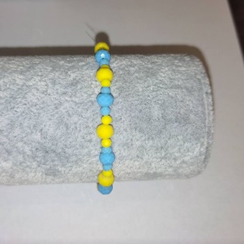 Armband „Ukraine“ aus tschechischem Kristall, mit facettierten Rondellen, auf elastischem Band, Durchmesser 6×4 mm ±, Durchmesser 3×2 mm ±, Länge 18 cm ±