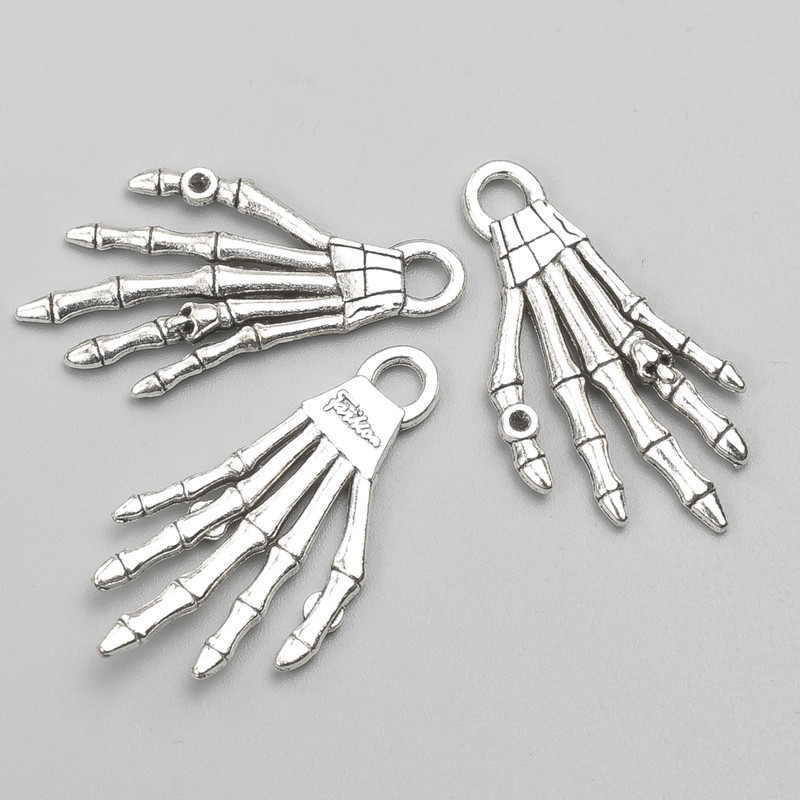 Schmuckzubehör Anhänger „Skelett-Hand“ 35×18 mm, Verpackung: 9 Stück, ca. 20 g