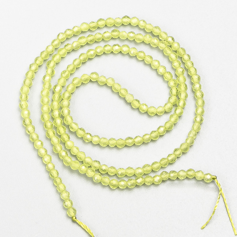 Feine Spinell-Perlen (synthetisch) gelb-limette, facettierte Kugeln, Durchmesser ca. 2 mm, auf der Schnur, Länge 37 cm