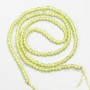 Feine Spinell-Perlen (synthetisch) gelb-limette, facettierte Kugeln, Durchmesser ca. 2 mm, auf der Schnur, Länge 37 cm