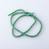 Seed-Beads aus tschechischem Kristall, matt, auf einer Schnur 'Grüne Erbse', Durchmesser 3,5 mm, Länge 38–40 cm