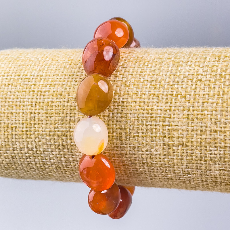 Armband aus Karneol, Naturstein, facettierte Perlen, Durchmesser ca. 14×12 mm, Länge 18 cm (Elastikband)