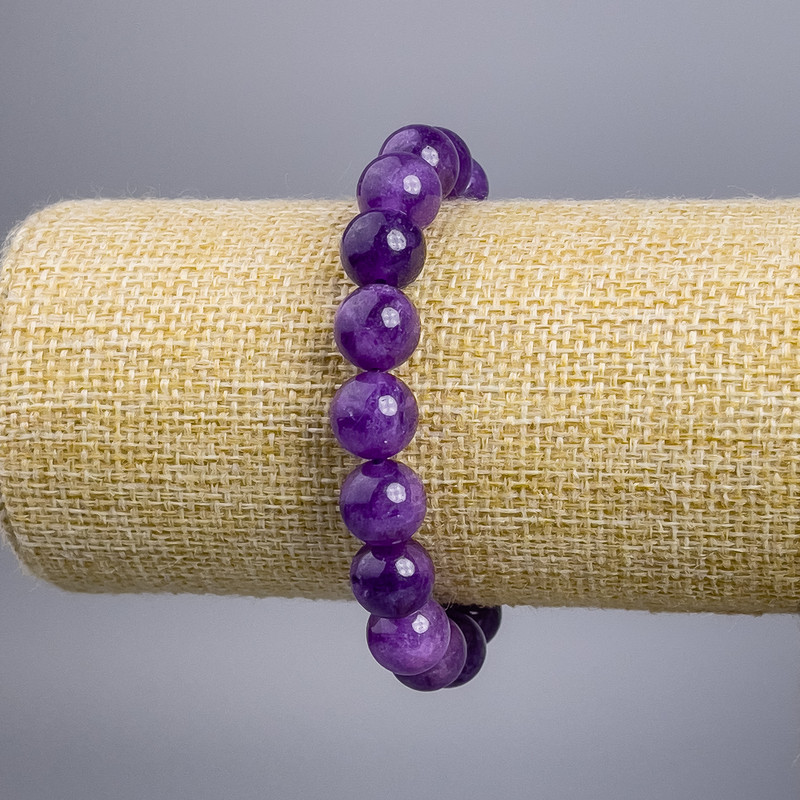 Armband aus Sugilit (künstlich) mit glatten Kugeln, Durchmesser ca. 10 mm, Länge 18 cm, Stretch
