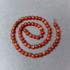 Rote Jaspisperlen (gepresst) glatte Kugeln, Durchmesser ca. 6 mm, Länge ca. 39 cm, auf Schnur