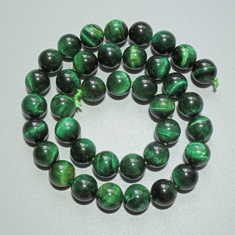 Grüne Katzenaugen-Perlen aus Naturstein, glatte Kugeln, Durchmesser ca. 10 mm, Länge ca. 38 cm, auf Faden