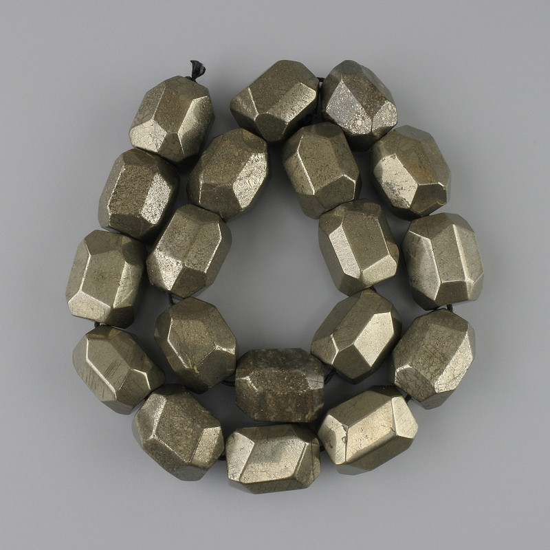 Pyrite beads, faceted, 20-21×15-17 mm, ±39 cm length on thread