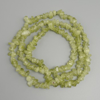Beads of tinted quartz chip, diameter 6–13×4–9 mm, length 80 mm on thread