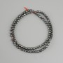Faceted hematite beads, round ball, 4 mm diameter, 38 cm length ± on beading thread