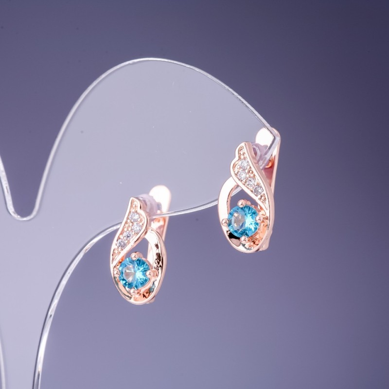 Earrings with blue crystals 16×7 mm in gold-tone metal