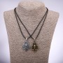 Matching friendship pendants Trefoils with skulls, length 42–48 cm, diameter 25×35 mm