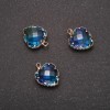 Pendant 'Heart' in blue color with a golden bezel 12×15 mm