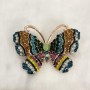 Sale! Butterfly Brooch with golden-pink metal, multicolored crystals, and green bead 46x34 mm +