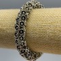 Women's bracelet with flowers, diameter 12 mm +-, length 18 cm (stretch) silver metal