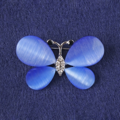 Брошка Метелик синє котяче око, білі стрази, сріблястий метал 25х38мм+-
