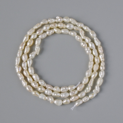Намистини Річкові перли, діаметр 3х4мм+-, довжина 36см+- на нитці