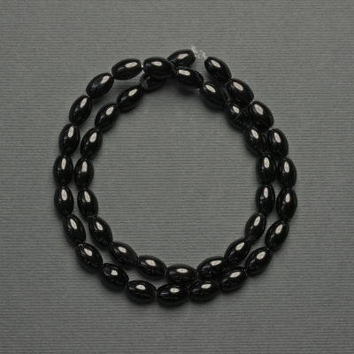 Намистини Агат зерно, діаметр 9х6мм+- на волосіні, довжина 39см+