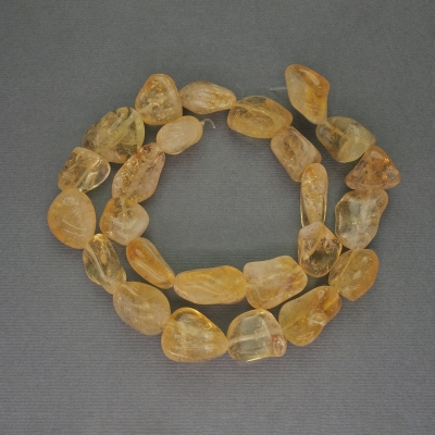 Намистини Цитрин галтівка, діаметр 14-18х13-17мм+- на волосіні, довжина 38см+