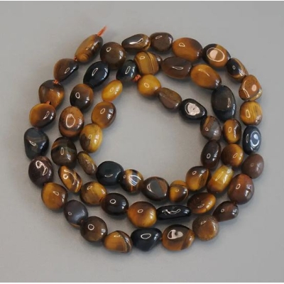 Намистини Тигрове Око галтівка, діаметр 6-10х7мм+-, довжина 40см+- на нитці Намистини Тигрове Око галтівка, діаметр 6-10х7мм+-, довжина 40см+- на нитці