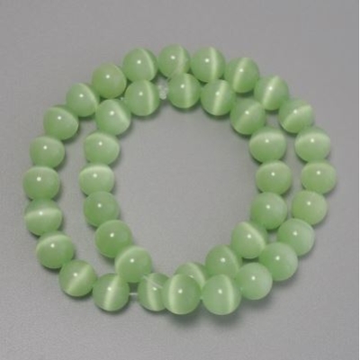 Намистини Котяче око салатове синтетичне каміння гладка кулька, діаметр 10мм+-на волосіні, довжина 38см+