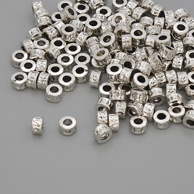 Фурнітура намистина вставка колір металу срібло, діаметр 4Х2, 5мм+- отвір, діаметр 2мм+-фасування 20гр. (~ 128шт. )