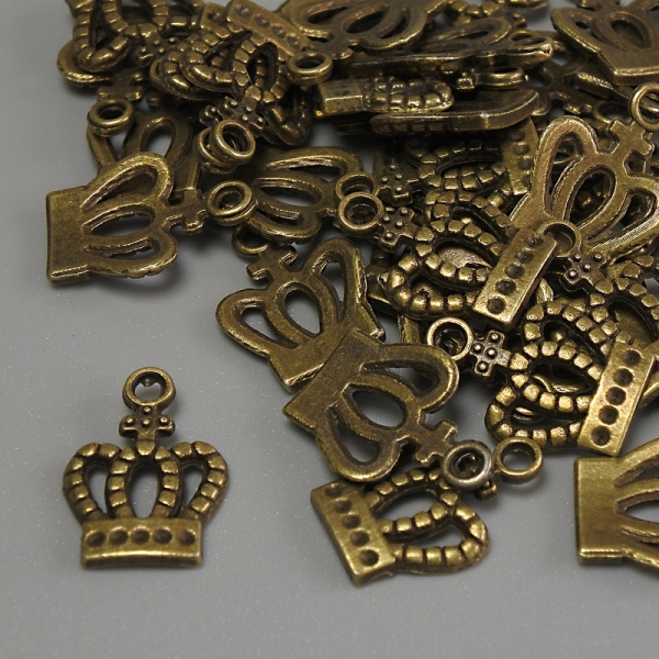 Фурнітура підвіска Корона колір металу бронза, розміри 15х10х1мм+- отвір, діаметр 2мм+- фасування 20гр (~36шт. )