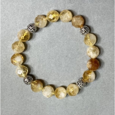 Браслет Цитрин гранована кулька 10мм+- з металевими вставками, довжина 18см+- стрейч
