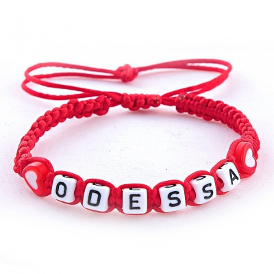 Браслет плетений з червоного шнура з написом "Odessa"