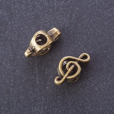 Фурнітура вставка "Скрипковий ключ" колір металу "бронза", діаметр 4мм фас. 20 грам + -11шт