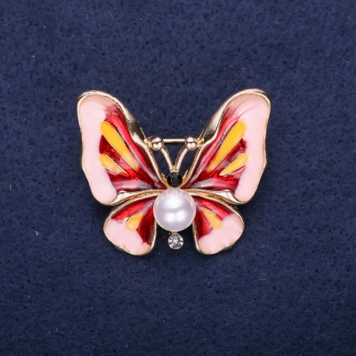 Брошка Метелик з перловою намистиною рожева і червона емаль 30х35мм жовтий метал