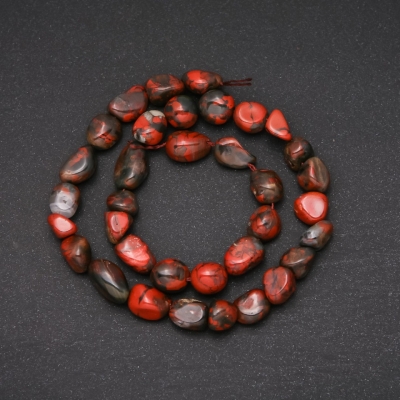 Намистини на нитці з натурального каменю Яшма Червона галтівка, діаметр 8х13 (+ -) мм, довжина 38см
