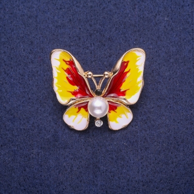Брошка Метелик з перловою намистиною і емаль 30х35мм жовтий метал
