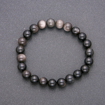 Браслет з натурального каменю Сріблястий Обсидіан на резинці гладка кулька, діаметр 8(+-)мм, довжина  18см