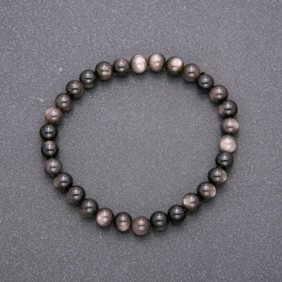 Браслет з натурального каменю Сріблястий Обсидіан на резинці гладка кулька, діаметр 6(+-)мм, довжина  18см