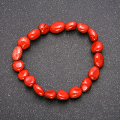 Браслет на гумці з натурального каменю Яшма червона галтовка, діаметр  8-12мм+-, довжина 18см+-
