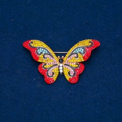 Брошка Метелик різнокольорові стрази, золотистий метал 35х58мм + -