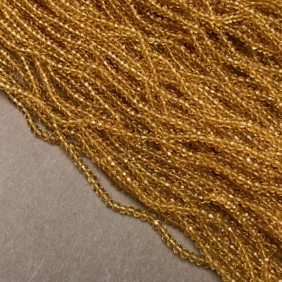 Намистини Чеський Кришталь на волосіні жовте медовий прозоре гранований рондель, діаметр 3х2,5мм + -, довжина 36см + -