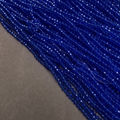 Намистини Чеський Кришталь на волосіні синє прозоре гранований рондель, діаметр 3х2,5мм + -, довжина 36-38см + -