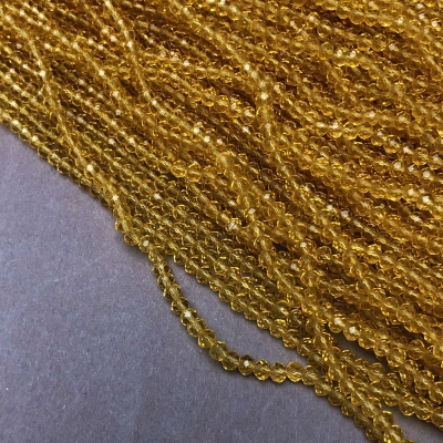 Намистини Чеський Кришталь на волосіні світло-жовте медовий прозоре гранований рондель, діаметр 3,5х3мм + -, довжина 36-38см + -
