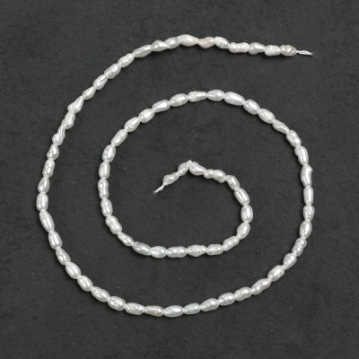 Натуральний річковий перли на нитці, діаметр 6х3мм + -, довжина 35см + -