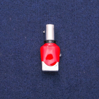 Брошка Лак червона і чорна емаль, сріблястий метал 13х33мм