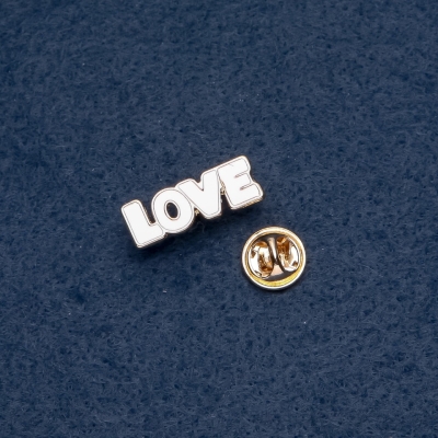 Брошка "LOVE" 25х10мм колір металу "золото"