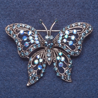 Брошка "Метелик" сині стрази хамелеон колір металу срібло 6х4см