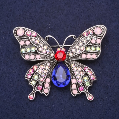 Брошка Метелик тільце синій кристал рожеві стрази 50Х43мм сріблястий метал