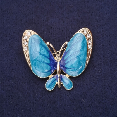 Брошка Метелик білі стрази емаль колір блакитний 36х42мм жовтий метал