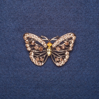 Брошка "Метелик" в золотистих стразах колір металу золото 4,5х3см