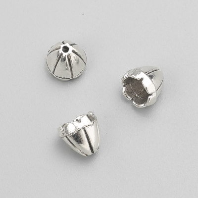 Фурнітура наконечник колір металу срібло, діаметр 7х8(+-)мм фасовка -20гр. 29(+-)шт.
