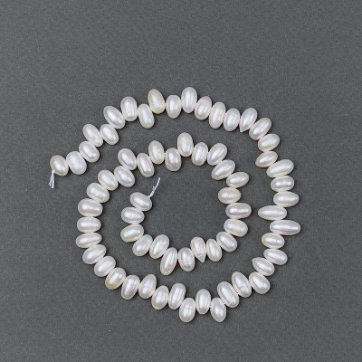 Річкові білі перлини овальні на нитці, діаметр 9,5х6мм+-,, довжина 36см+-