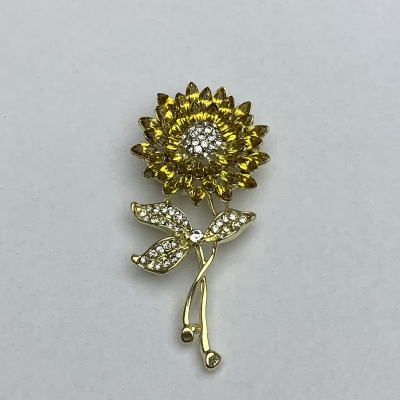 Брошка Квітка із жовтими та білими стразами 61х30мм золотий метал