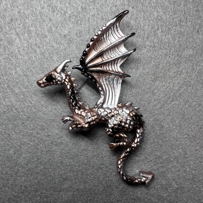 Брошка Дракон матова бронзова та чорна емаль сріблястий метал 42х66мм