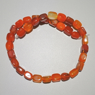 Намистини Агат помаранчевий натуральний камінь брусок, діаметр 9х12мм+-, довжина 38см+- на волосіні